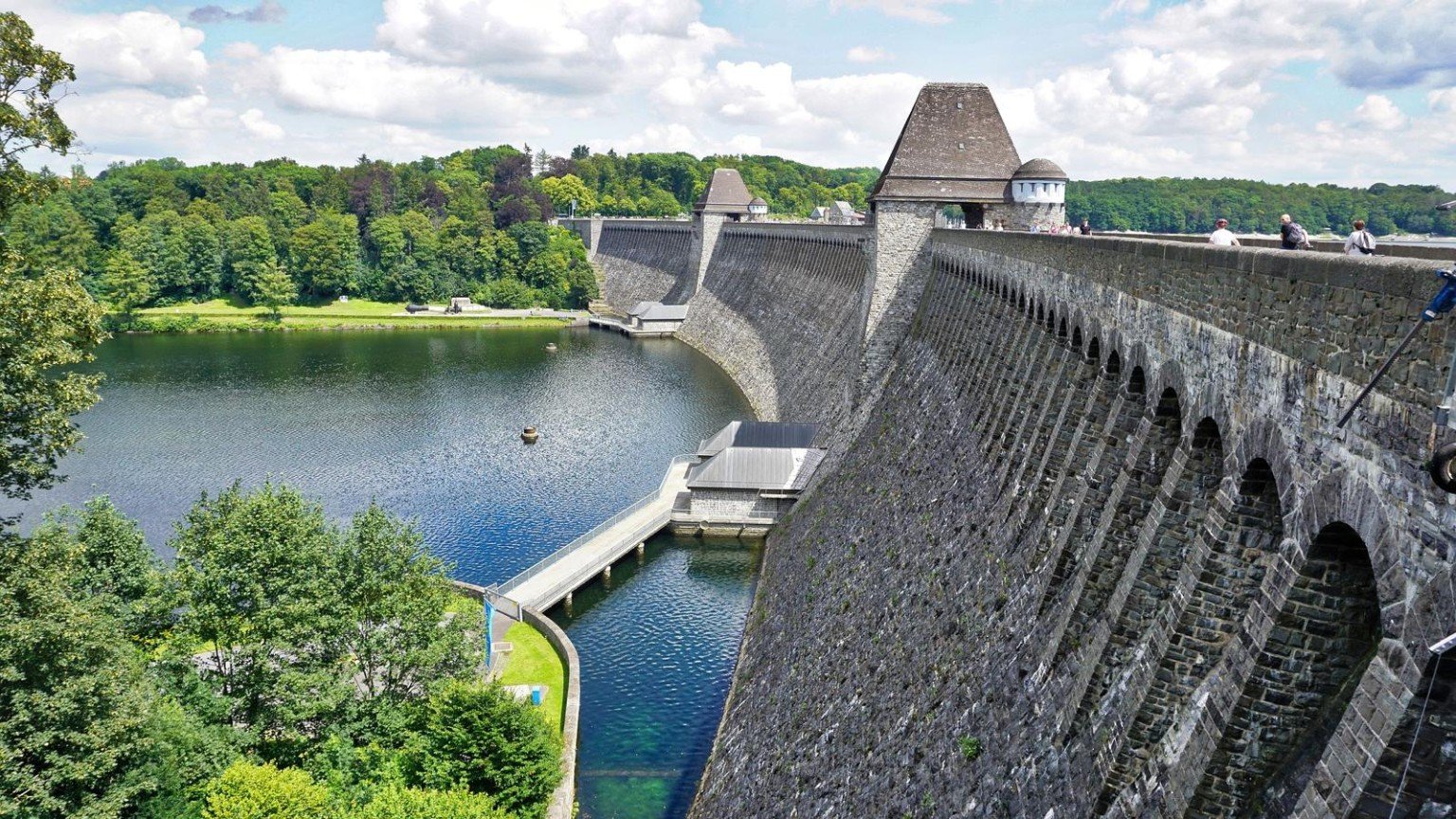 Dam wall beside a reservoir